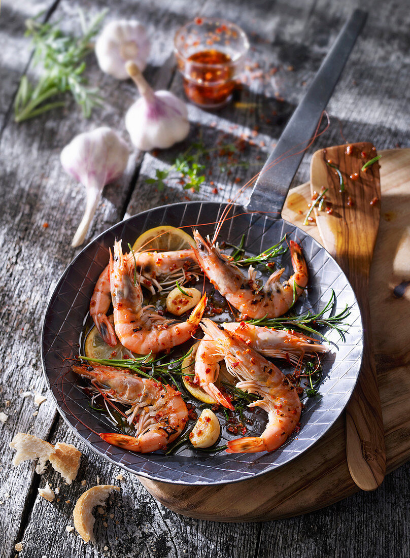 Prawns in a pan with garlic, herbs and spices