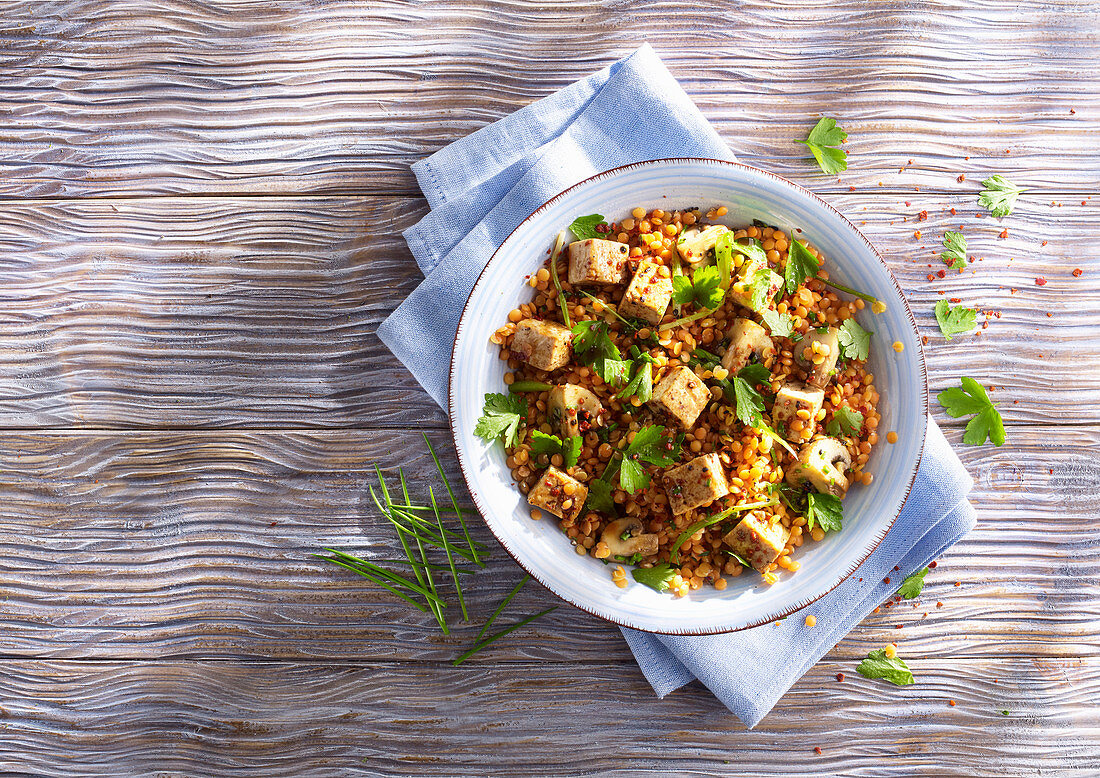 Fried tofu with yellow lentils and herbs