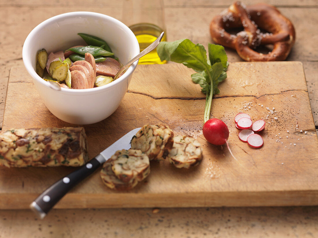 Bavarian sausage salad with mini pretzel dumplings