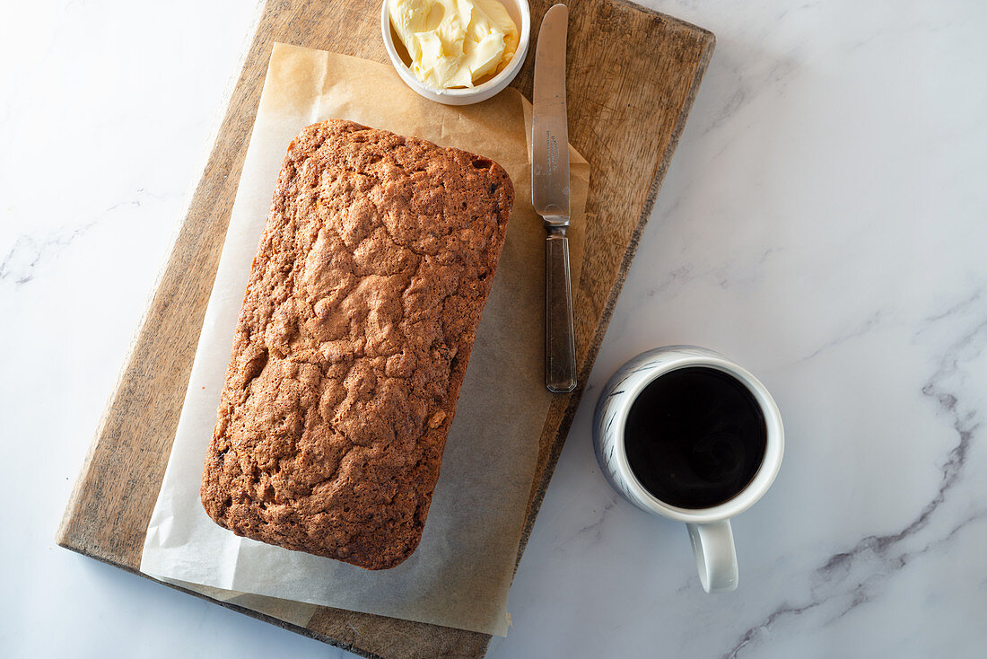 Banana bread with butter and coffee