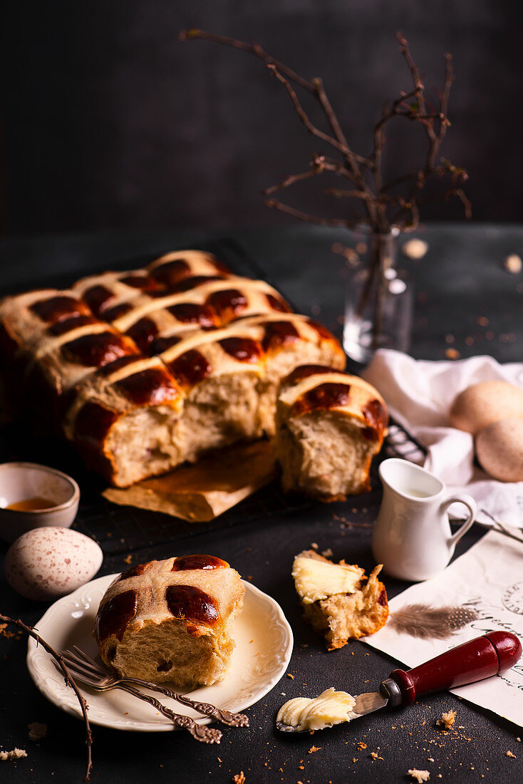 Easter hot cross buns with butter