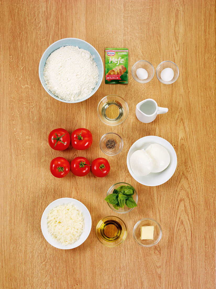 Ingredients for making a margherita pizza