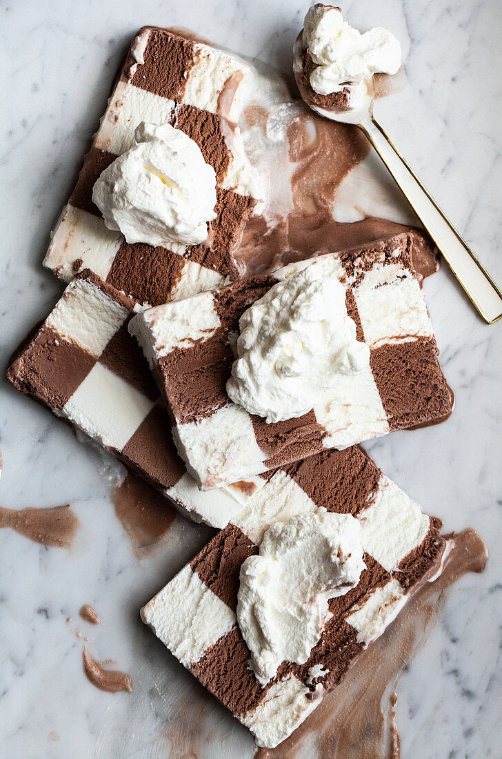 Slices of vanilla and chocolate checkerboard ice cream