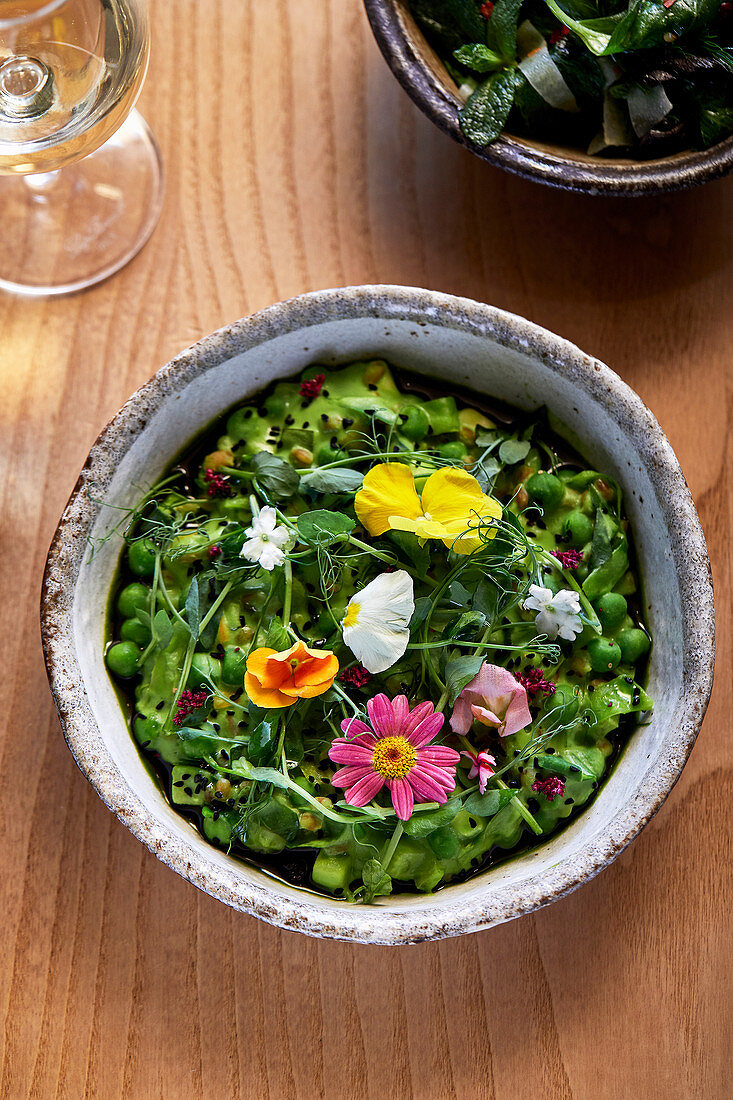 Spring pea and vegetable ragu, scamorza and toasted spelt