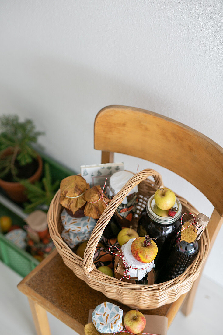 Basket of preserving jars and apples