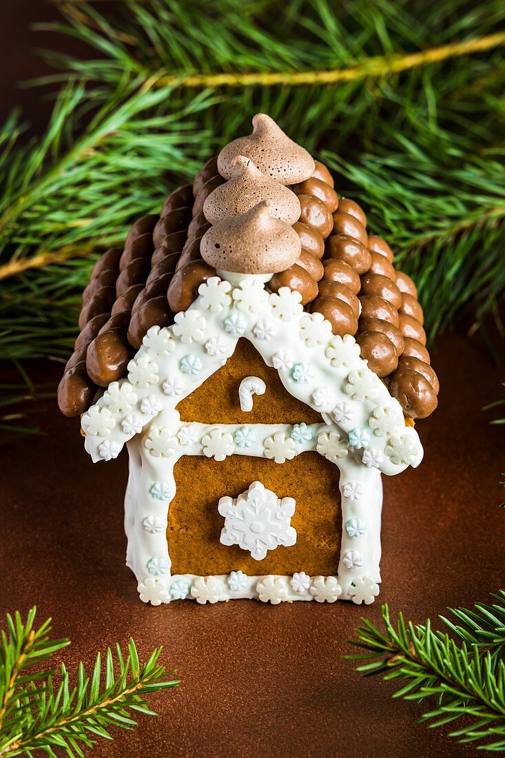 Christmas gingerbread house decorated with candies and royal icing