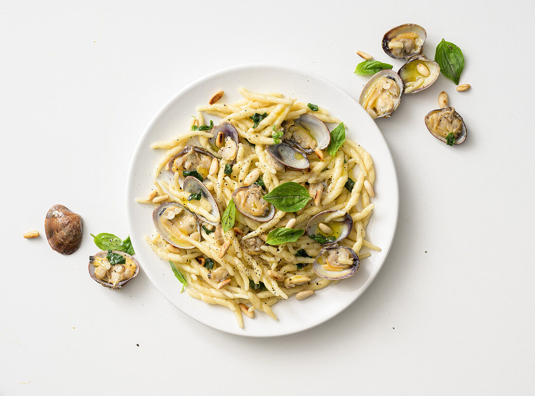 Trofie with clams, basil and roasted pine nuts