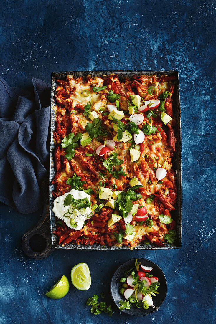 Cheesy chicken and pasta bake with avocado salsa