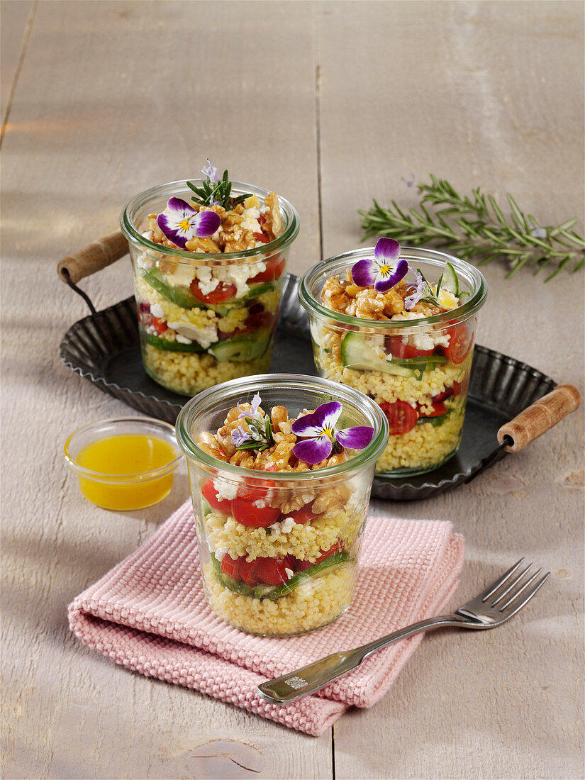 Layered salad with feta cheese and millet