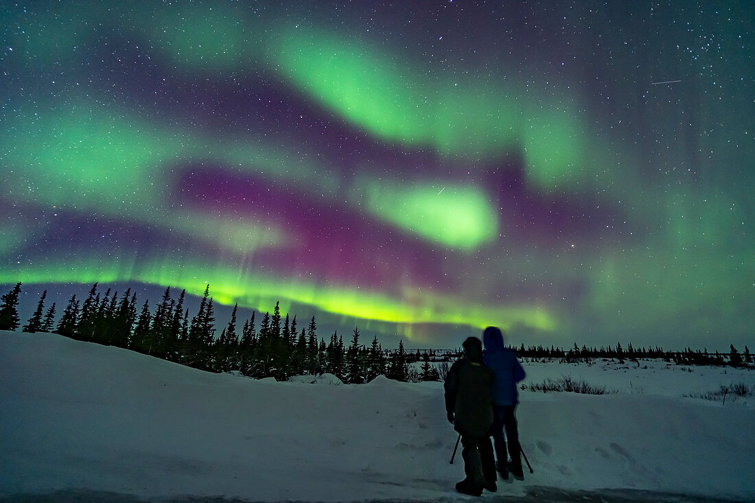 Couple watching the Northern Lights