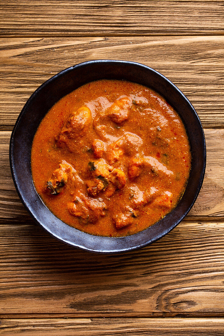 Indian chicken curry with tomato gravy