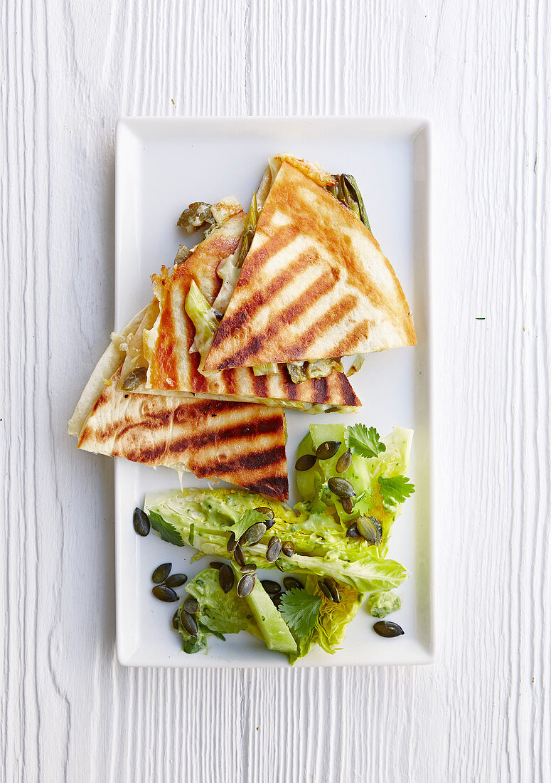 Spring onion quesadillas and guacamole salad