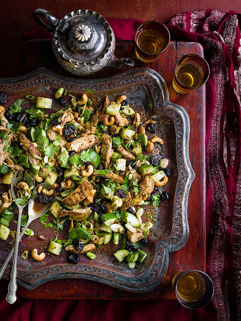 Persian marinated, spiced chicken salad with cashews and cucumber