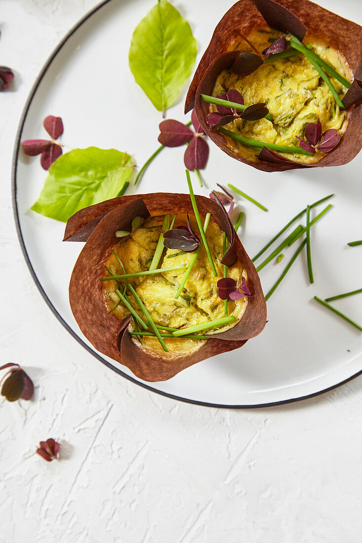 Spicy egg muffins with wild herbs