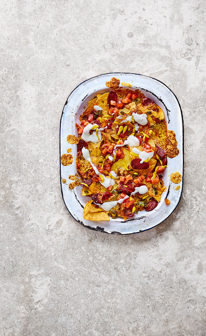 Caramelised onion and chorizo nachos