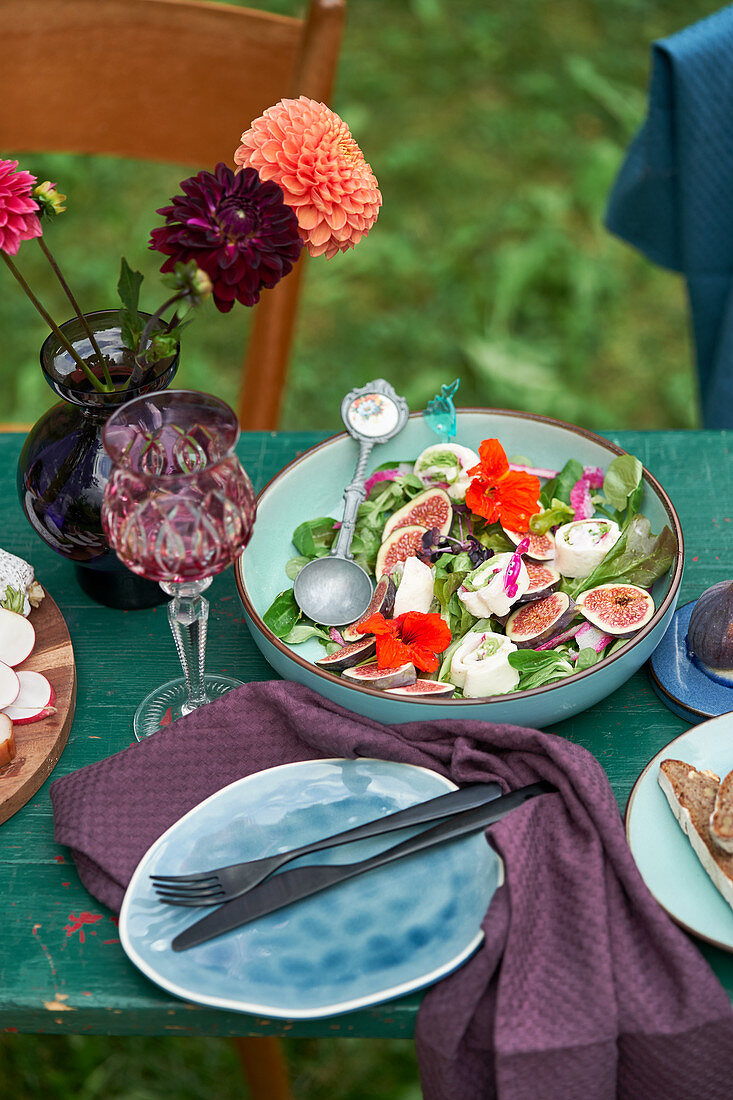 Fig and mozzarella salad with nasturtiums and blueberries