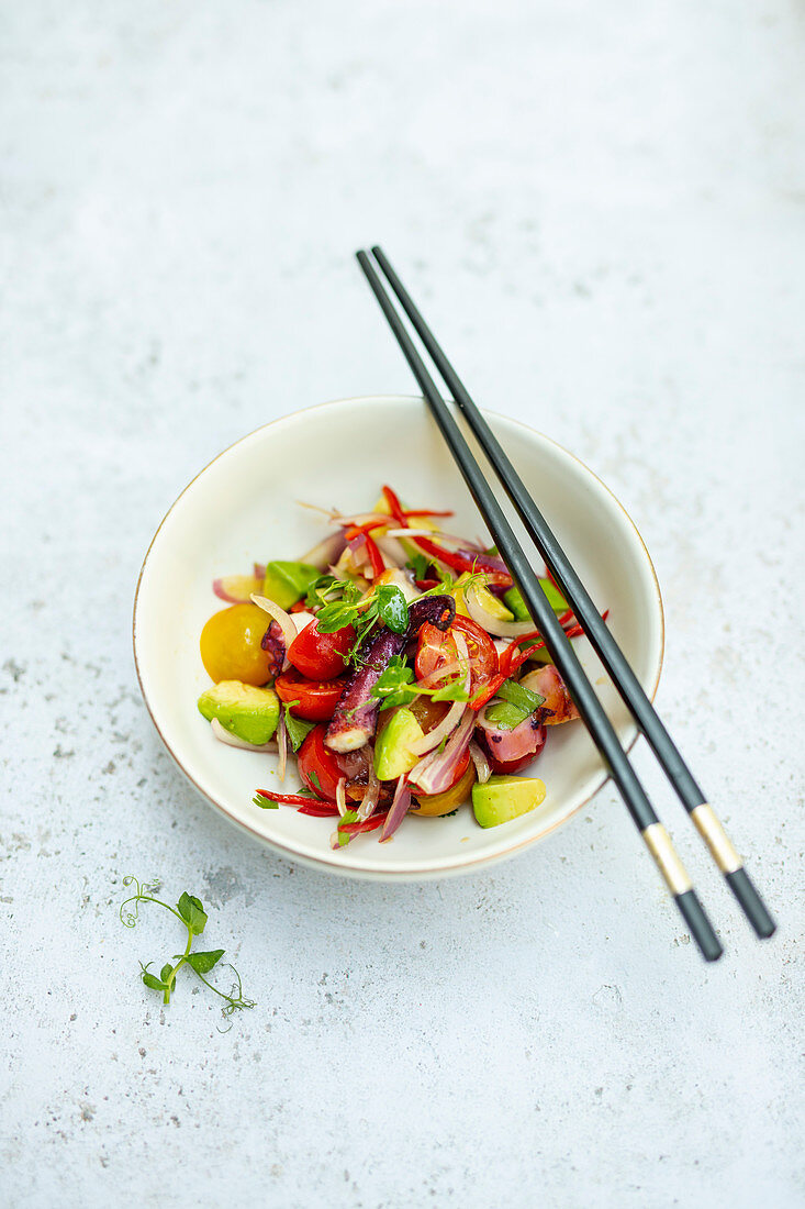 Japanese squid salad with tomatoes and avocado