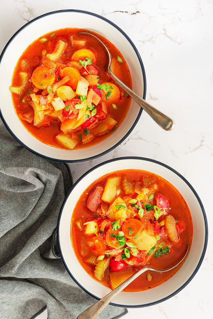 Tomato and vegetable soup with ham hock