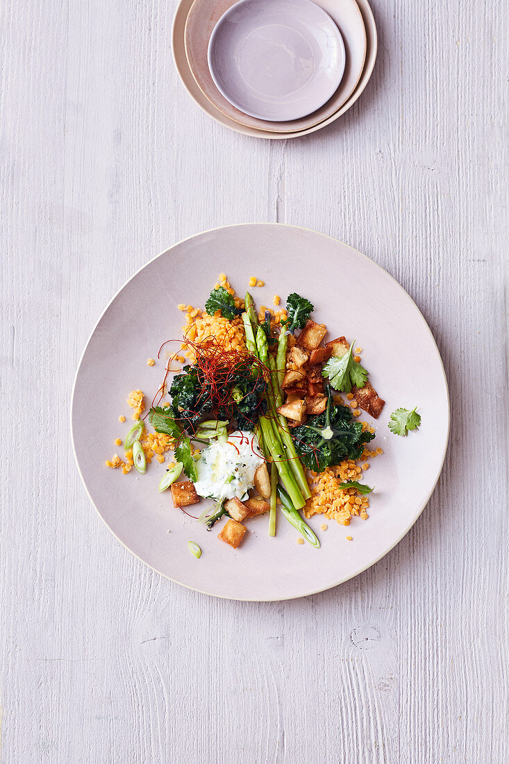 Lentils with flower sprouts, coriander and lime yoghurt and saffron threads