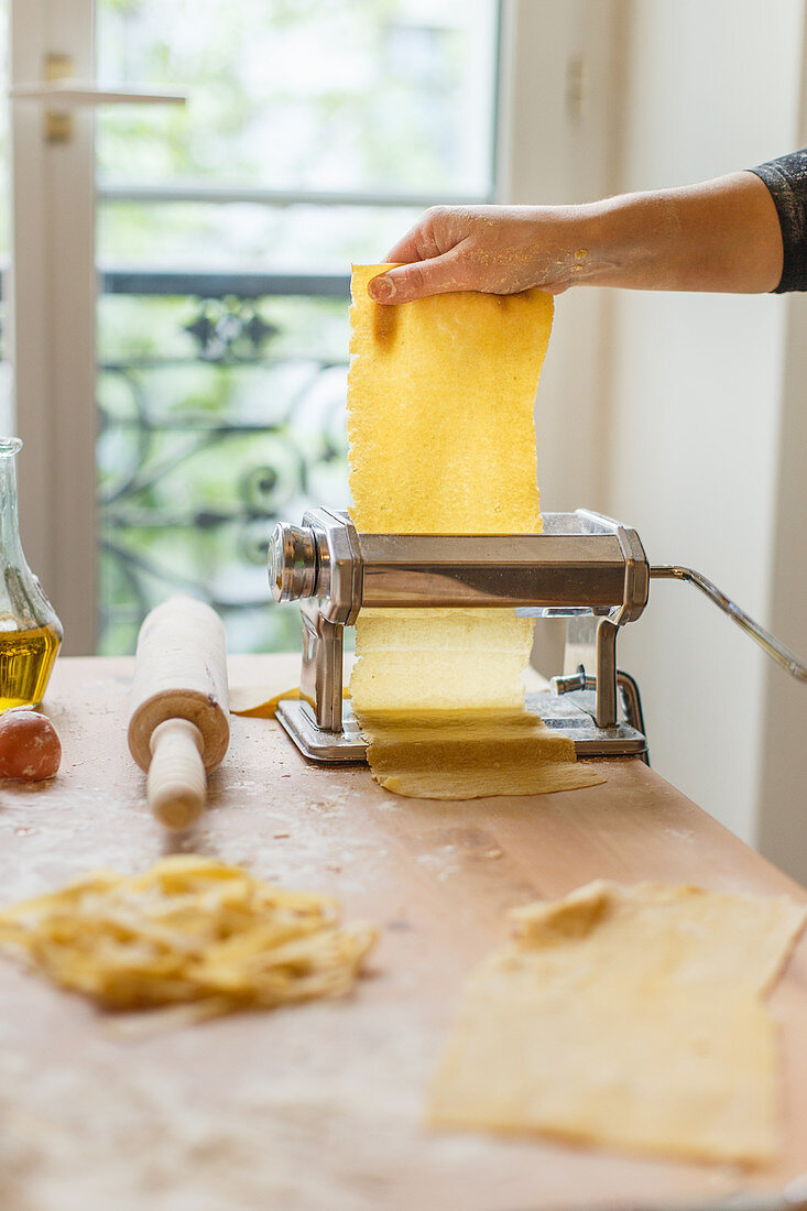 Rolling out pastry with pasta machine