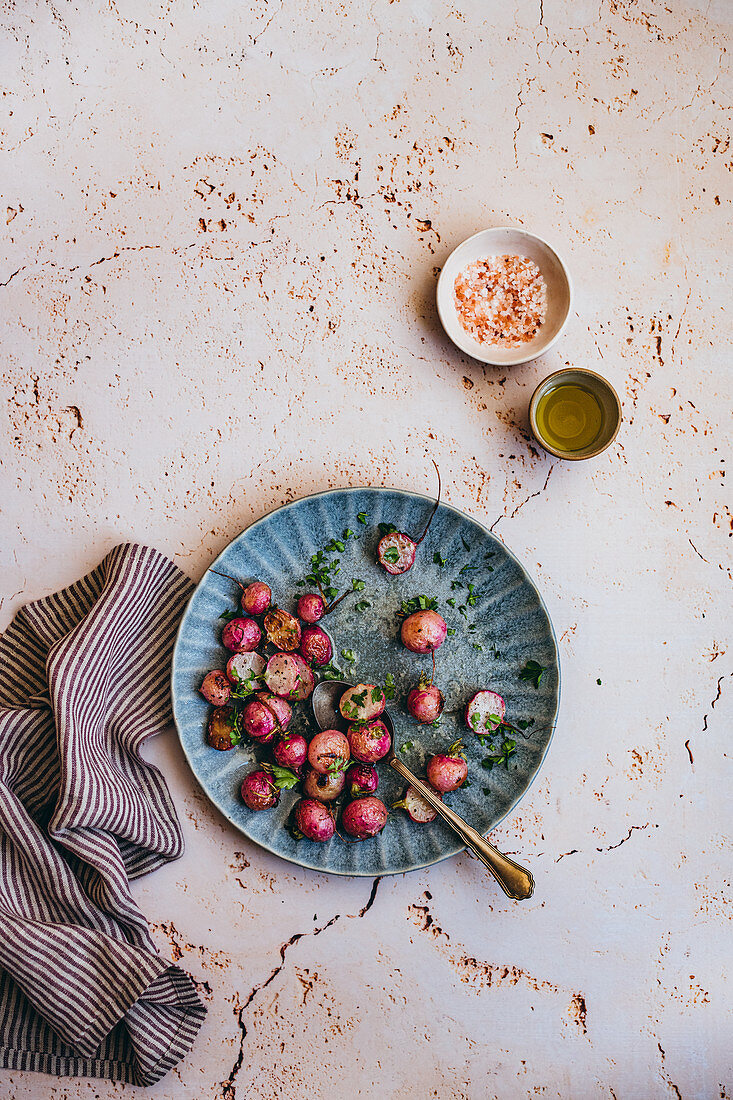 Roasted radishes with pink salt and olive oil