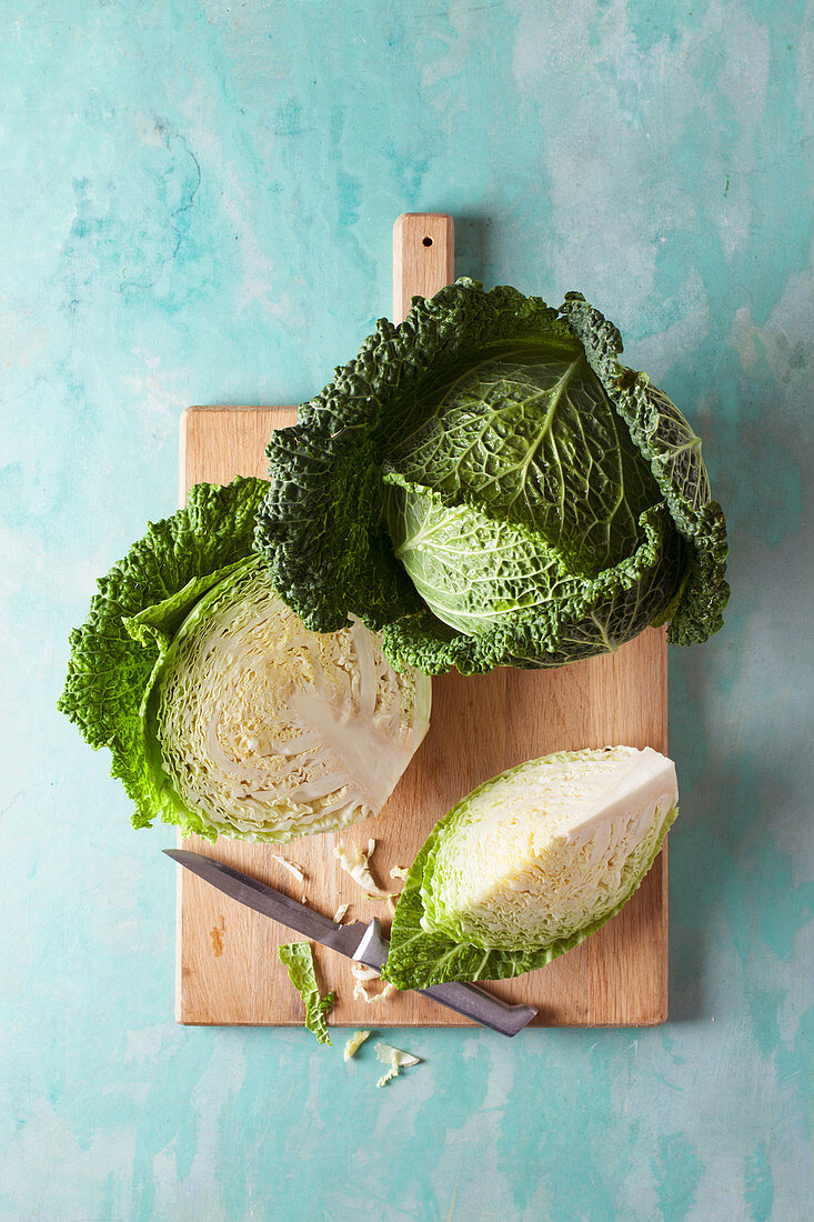 Savoy cabbage, whole and sliced