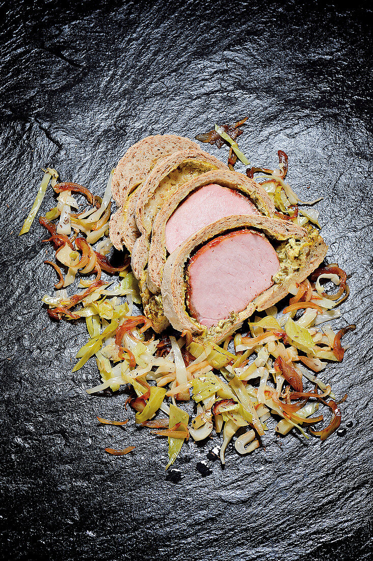 Gammon in a pomace crust with Bavarian cabbage