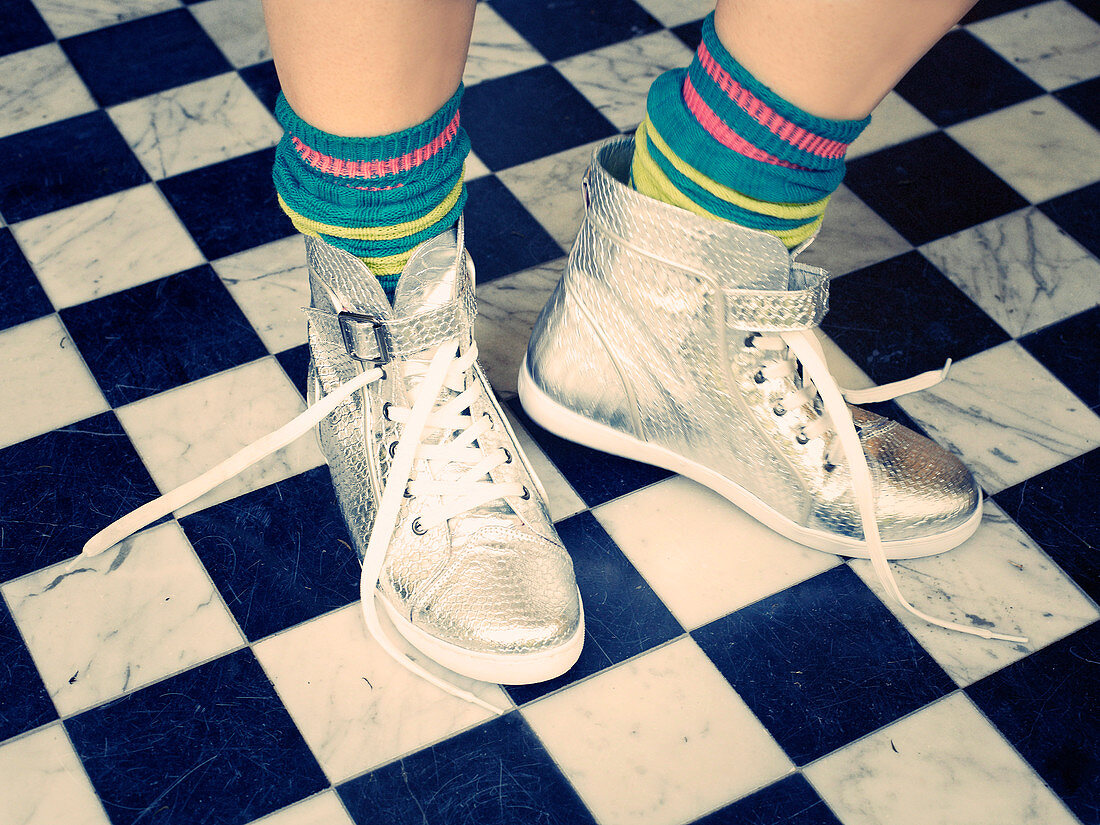 Colourful socks and high-top sneakers in silver