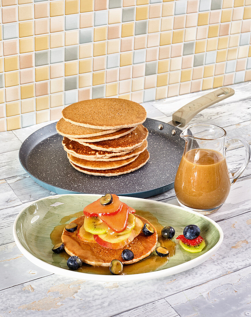 Sweet buckwheat pancakes with date caramel and fruits