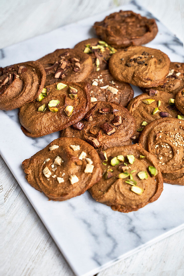 Vegan chickpea biscuits with cocoa, pistachios and chocolate