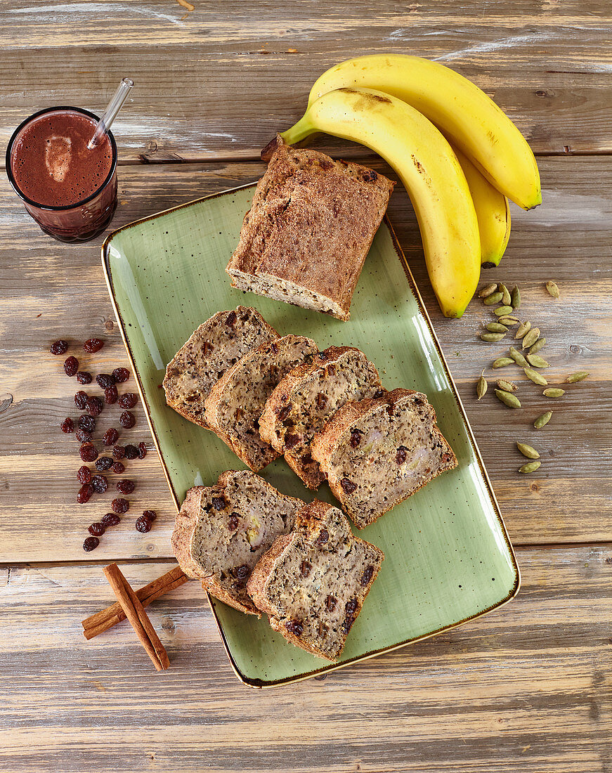 Banana bread with raisins and chocolate drink