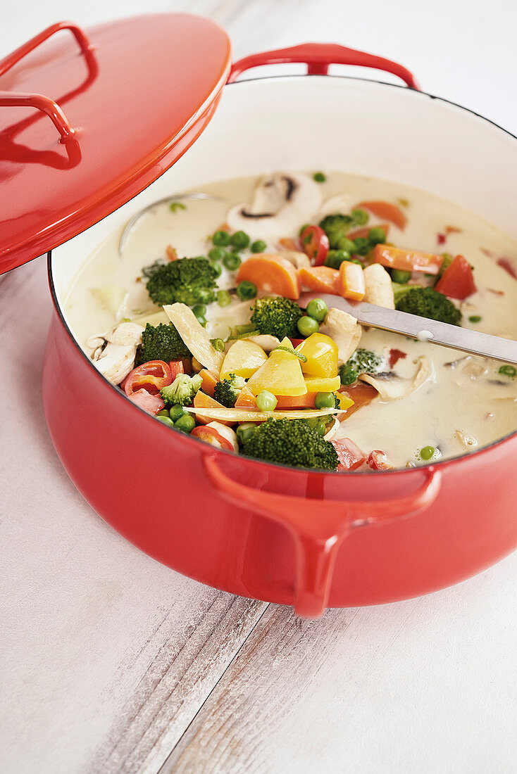 Vegetable and coconut soup with coconut