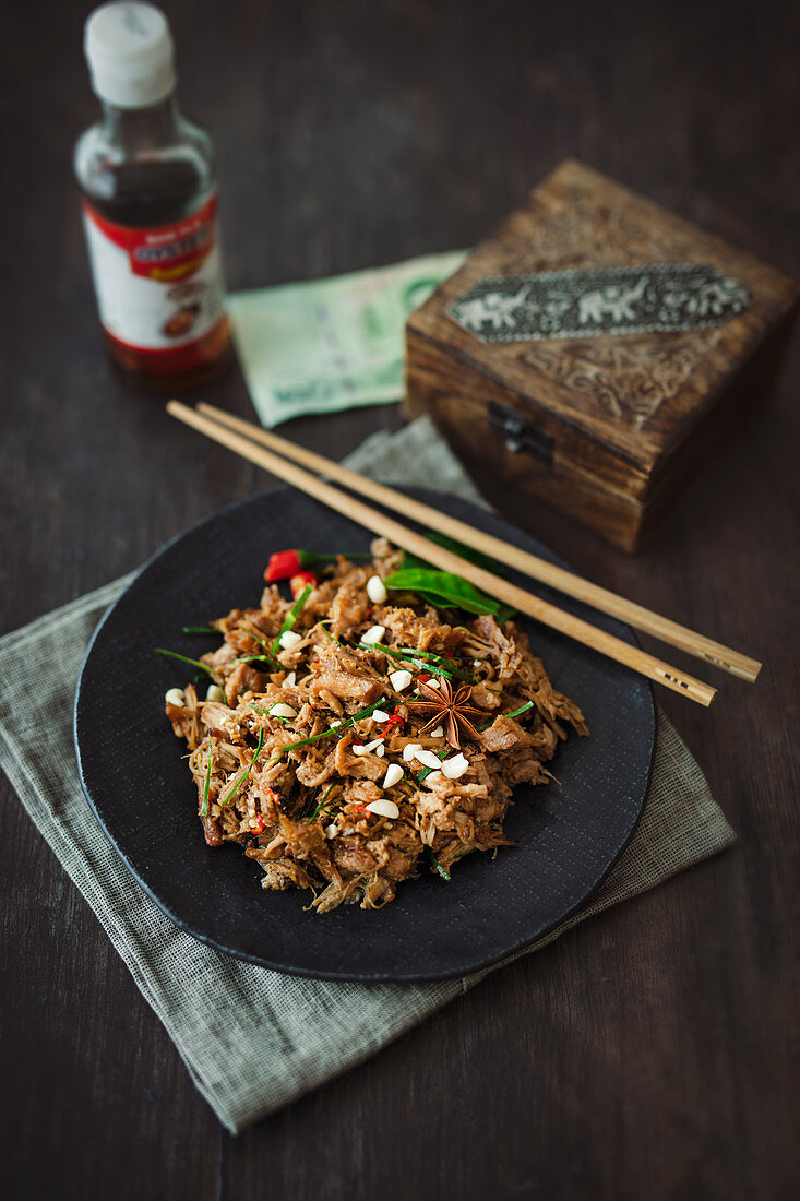 Double cooked pork with anise, oyster sauce and kaffir lime leaves (Asia)