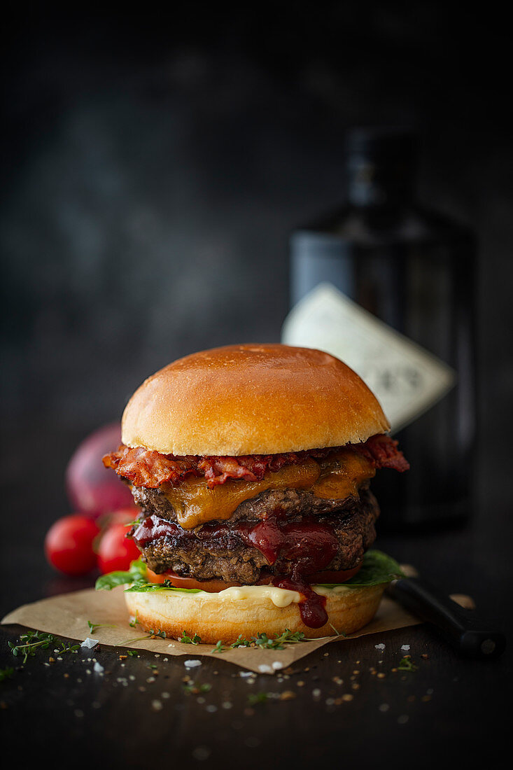 Double grilled Wagyu burger with cheddar, bacon and gin barbecue sauce