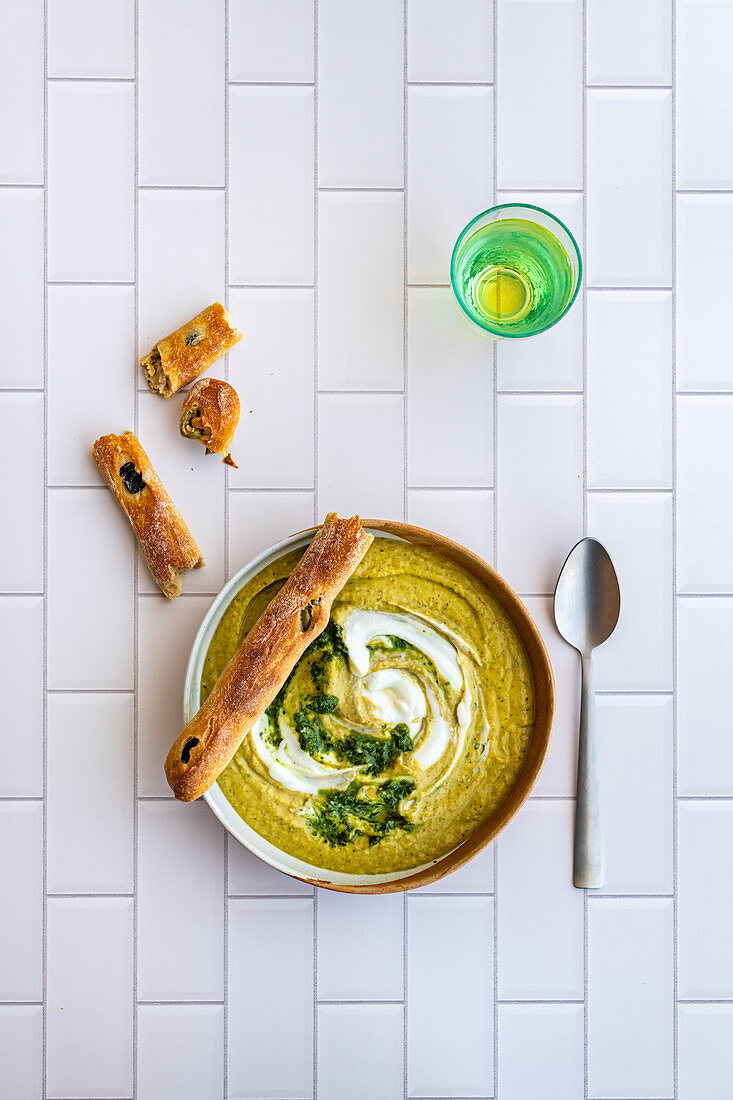 Broccoli soup with olive bread sticks