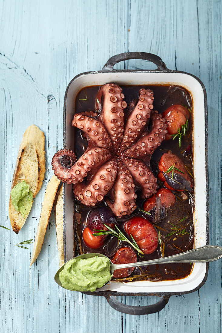 Oven roast Octopus with tomatoes and rosemary