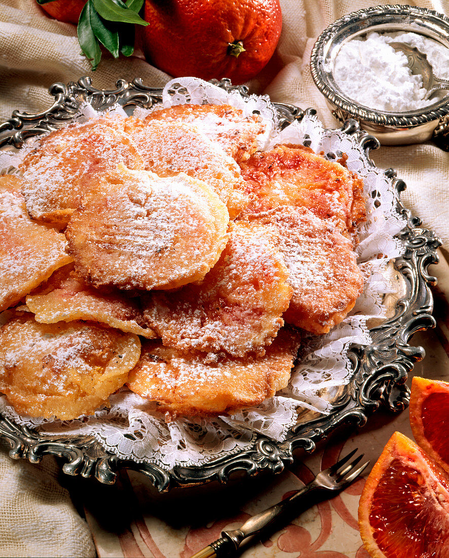 Frittelle all'arancia (Frittiertes Orangengebäck, Italien)