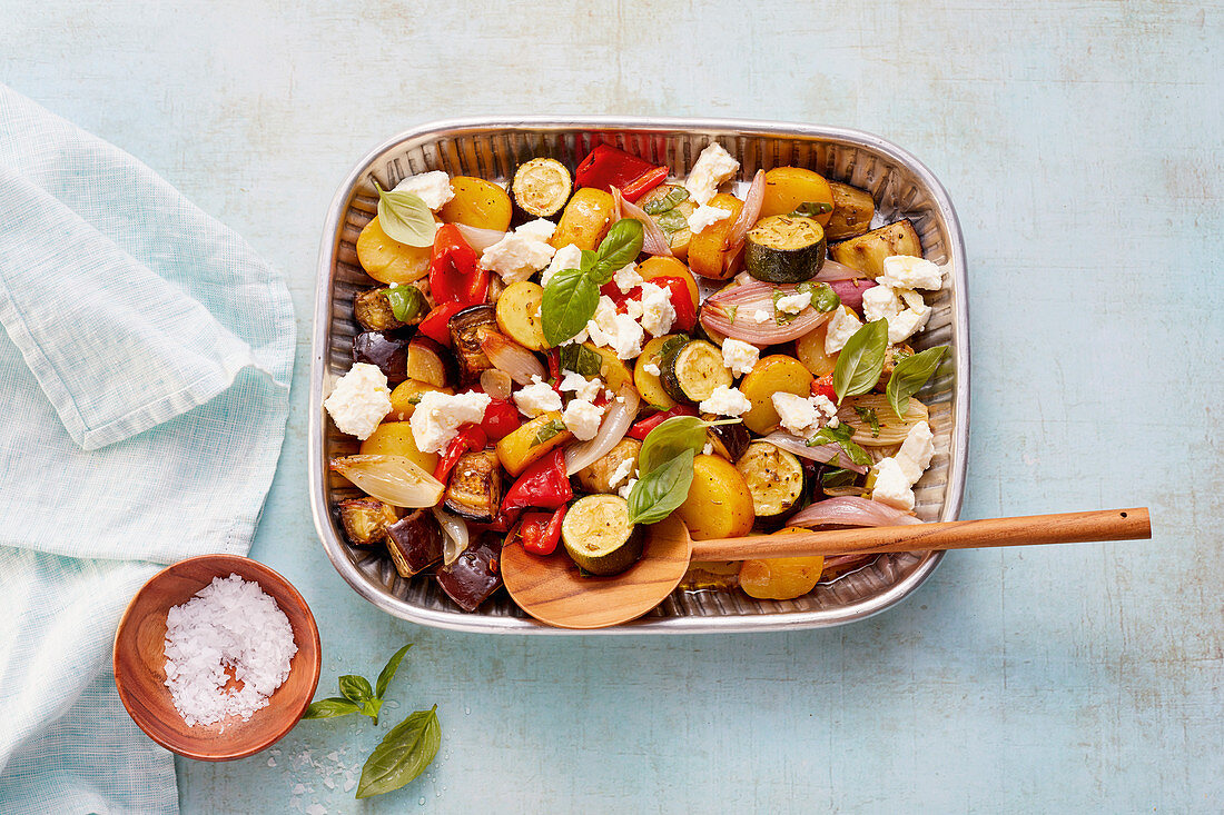 Mediterranean baked potato and vegetable salad with feta