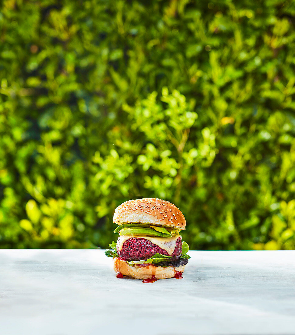 A vegan burger on an outdoor table