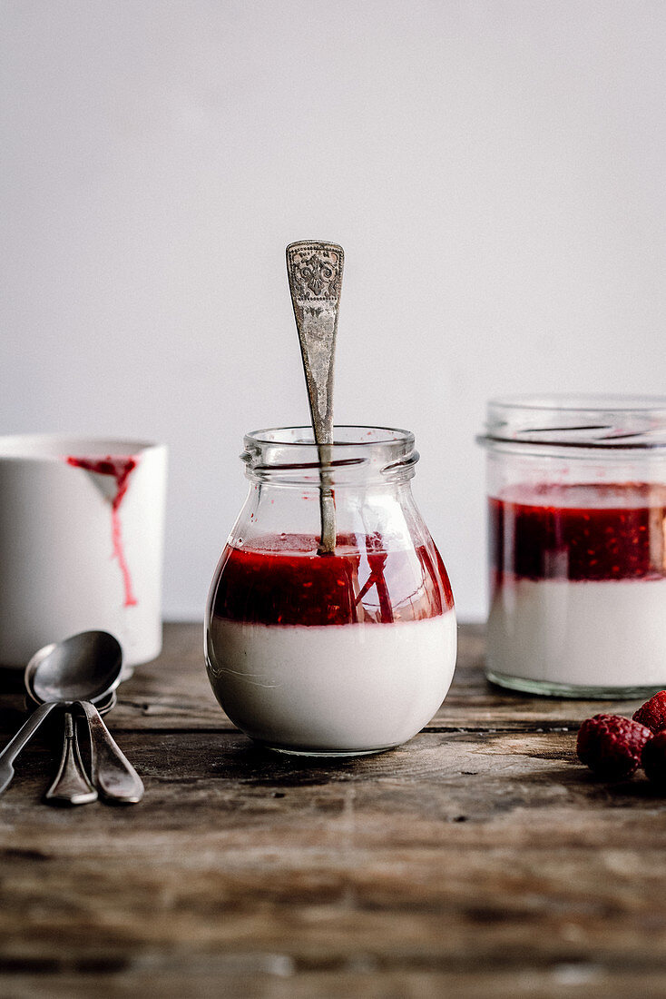 Panna cotta in a jar with raspberry mousse