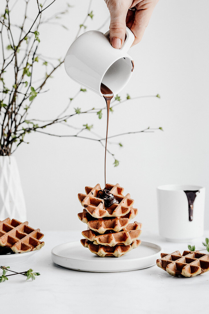 Vegan waffles covered with chocolate