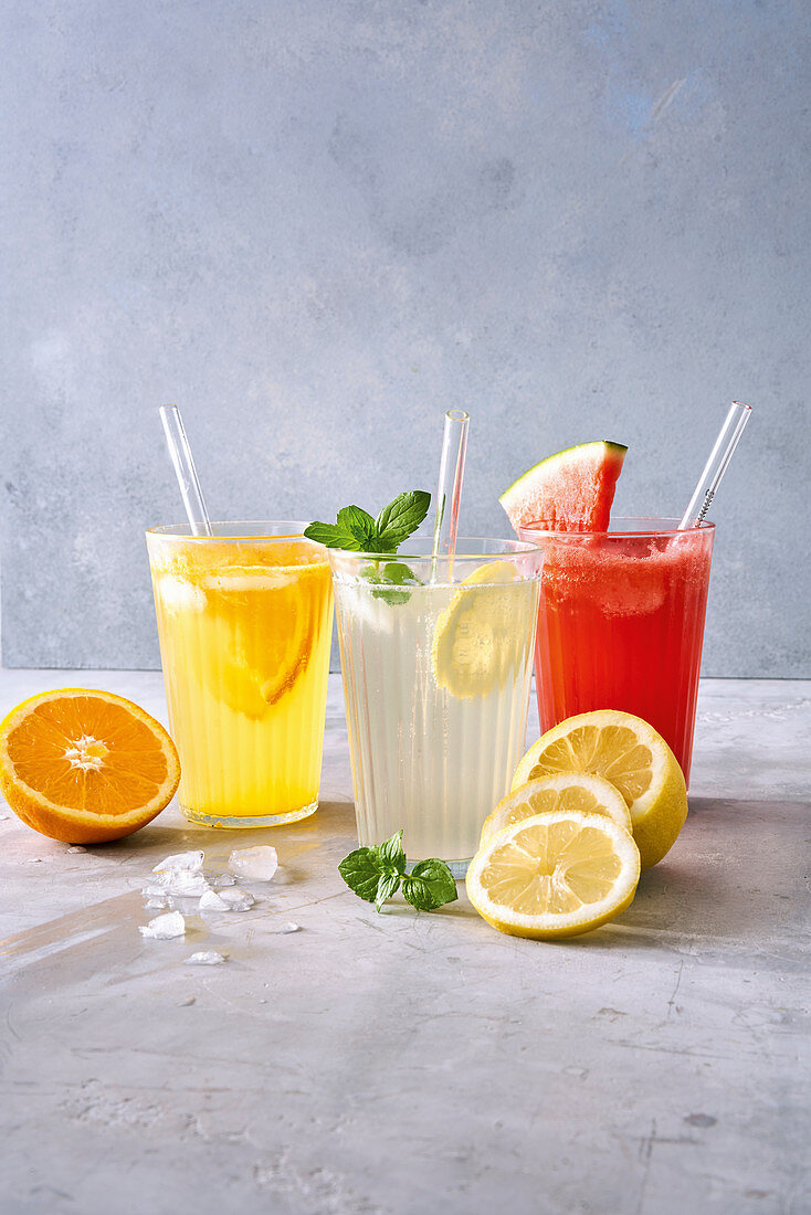 Homemade lemonade with melon, lemon and orange