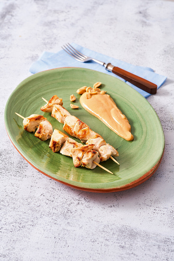 Chicken skewers with peanut sauce