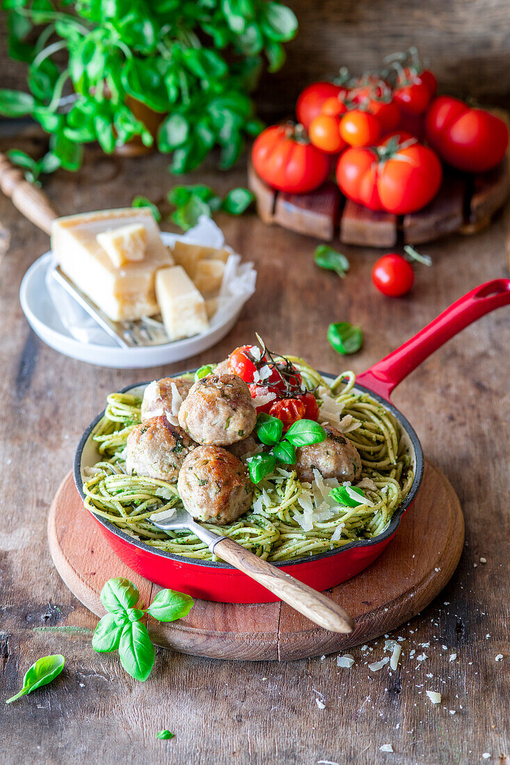 Spaghetti with pesto genovese and meatballs