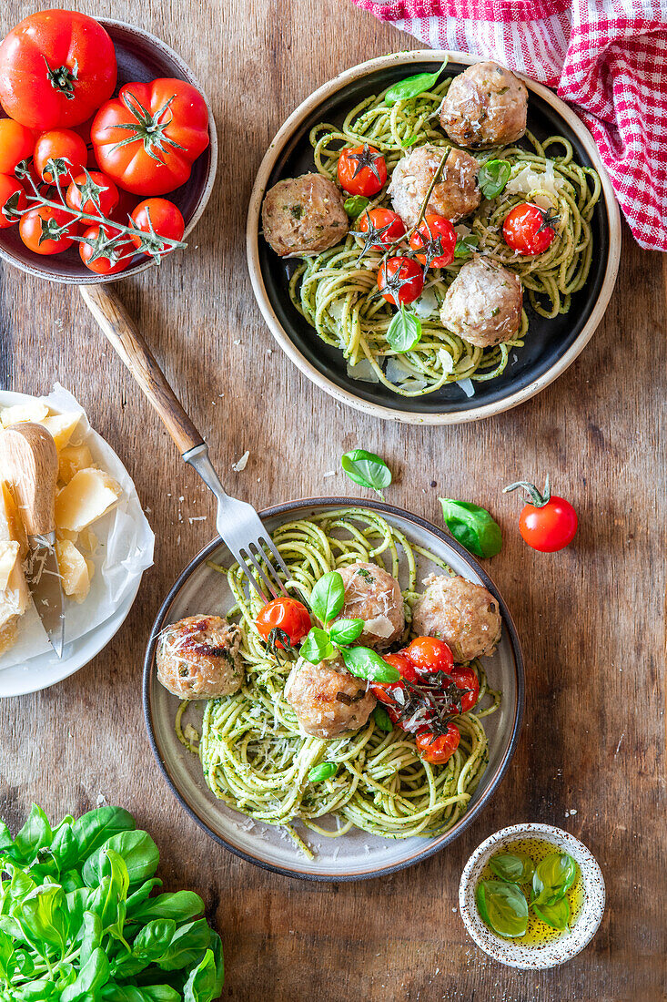 Spaghetti with pesto genovese and meatballs