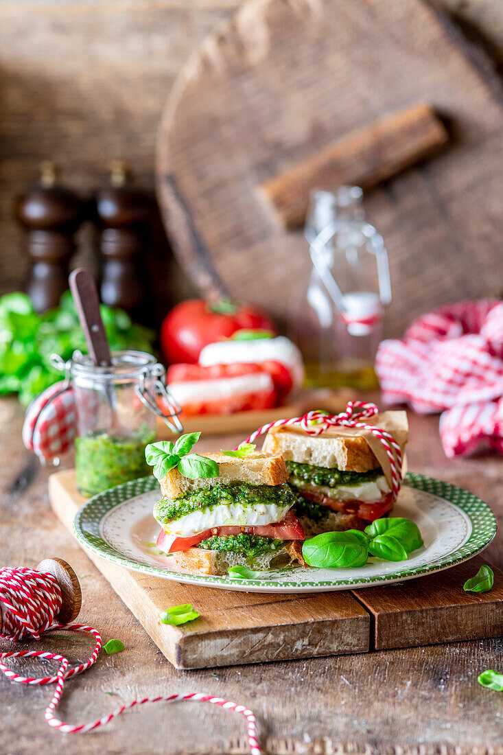Pesto tomato sandwich with mozzarella