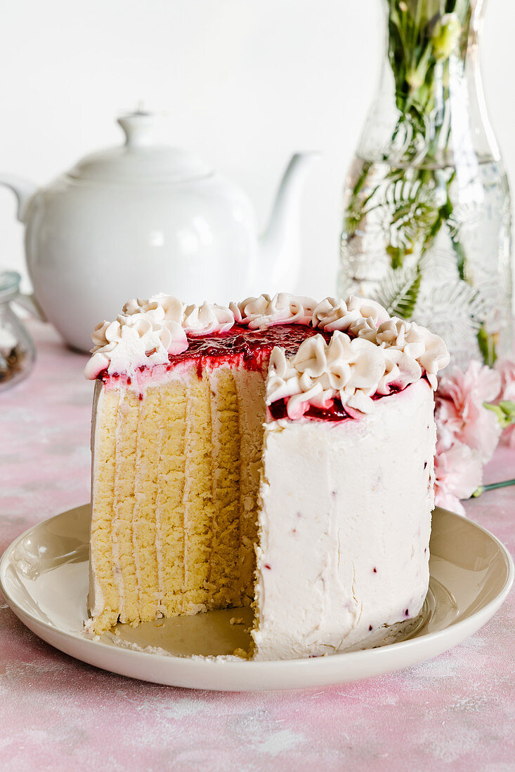 Vanilla and raspberry sponge roll cake