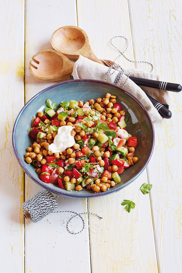 Warm chickpea salad with peppers and Greek yoghurt