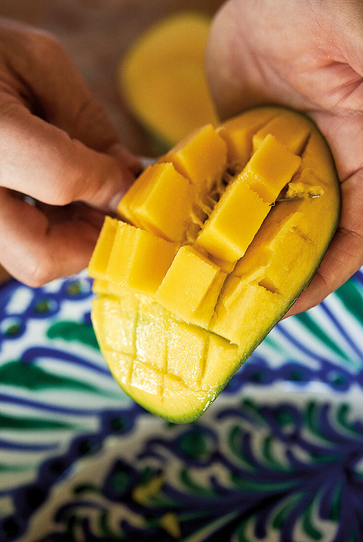 Mango being diced