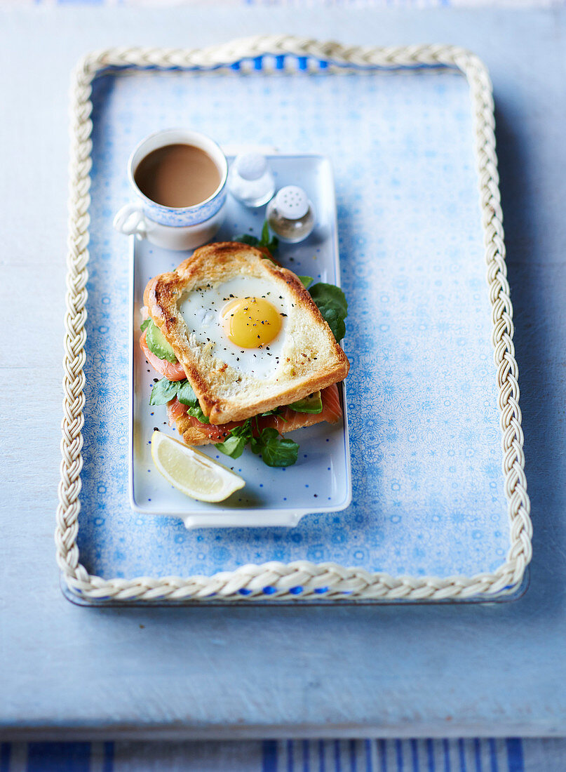 Egg-in-the-hole smoked salmon and avocado toastie